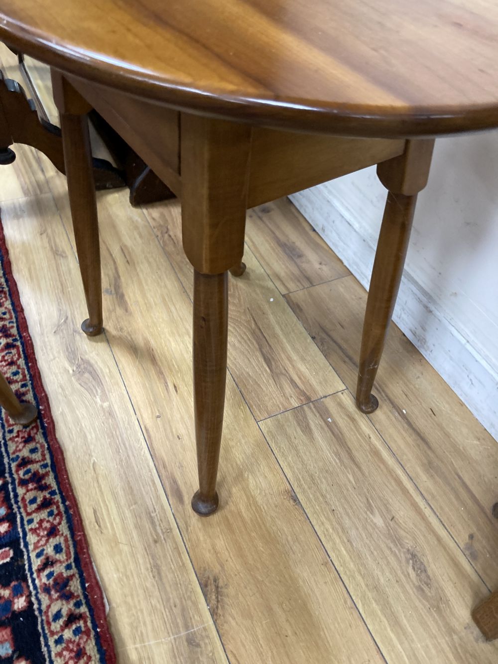 A pair of Leopold Stickley side tables, width 65cm depth 49cm height 58cm
